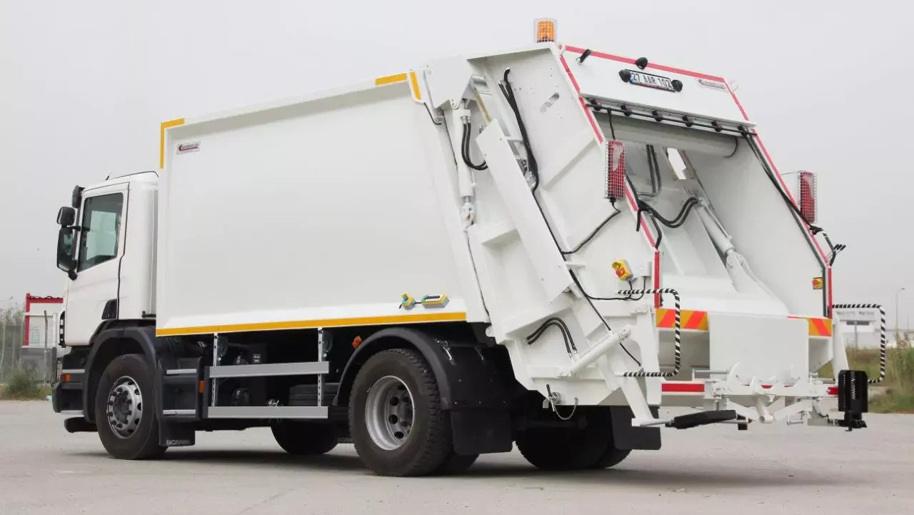 https://gtstransportations.com/wp-content/uploads/2024/11/garbage-truck-67327553afdc6-e1731360434395.webp